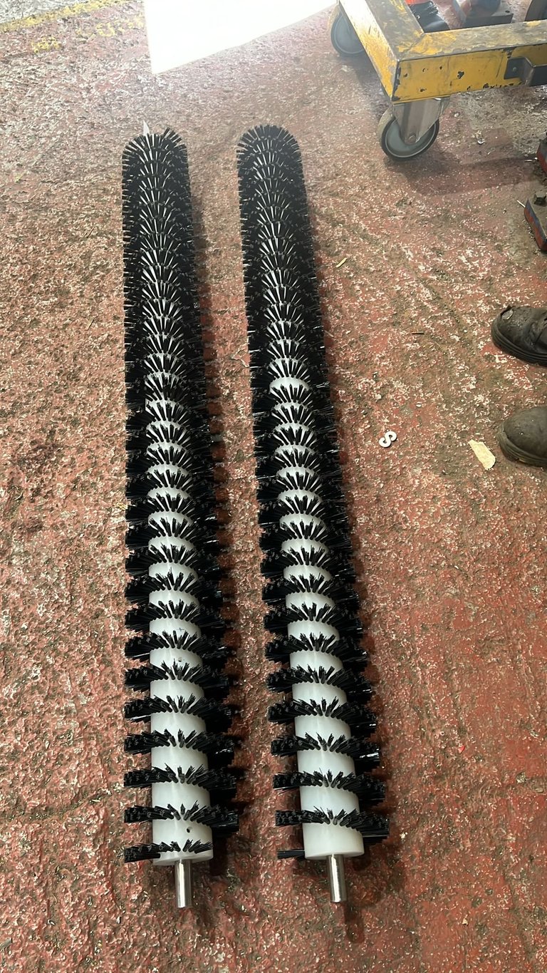 Street sweeper brushes with black bristles and white bands - commercial sweeping brush manufactured by Hilton's UK