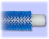 Blue cylindrical cleaning brush with white handle against light background