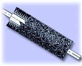 Two cylindrical mascara brushes with black glittery and textured bristles on lavender background