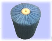 Blue and yellow daisy flower with layered petals against a lavender background